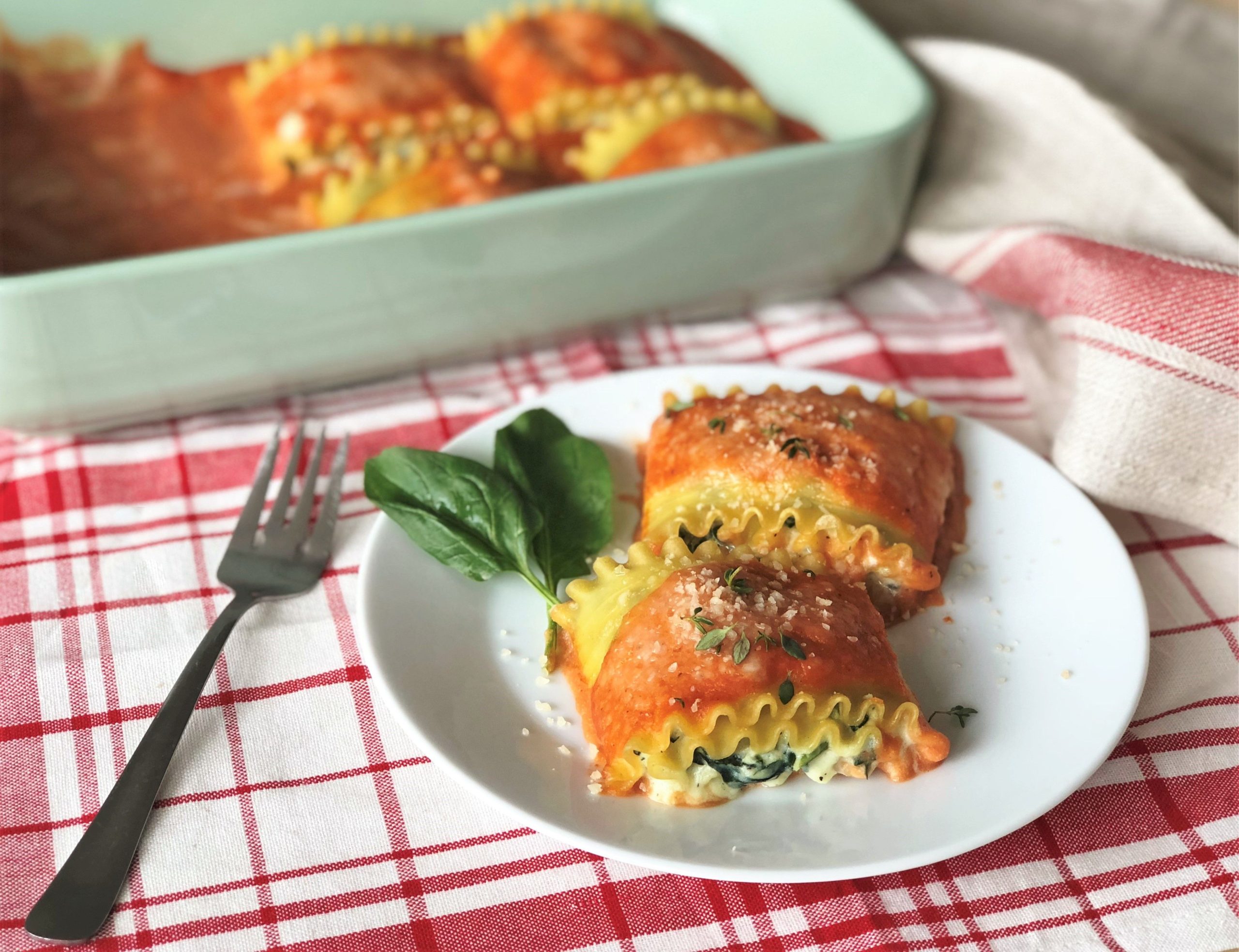 Rolled Stuffed Lasagna with Kale in a Tomato Cream Sauce