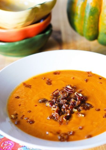 Cream of pumpkin soup topped with curried pecans