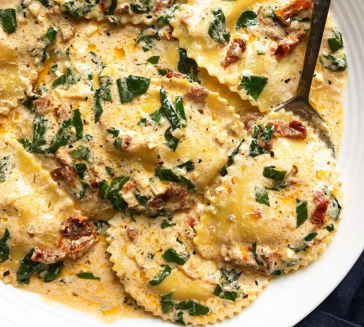 Ravioli with spinach and herb filling